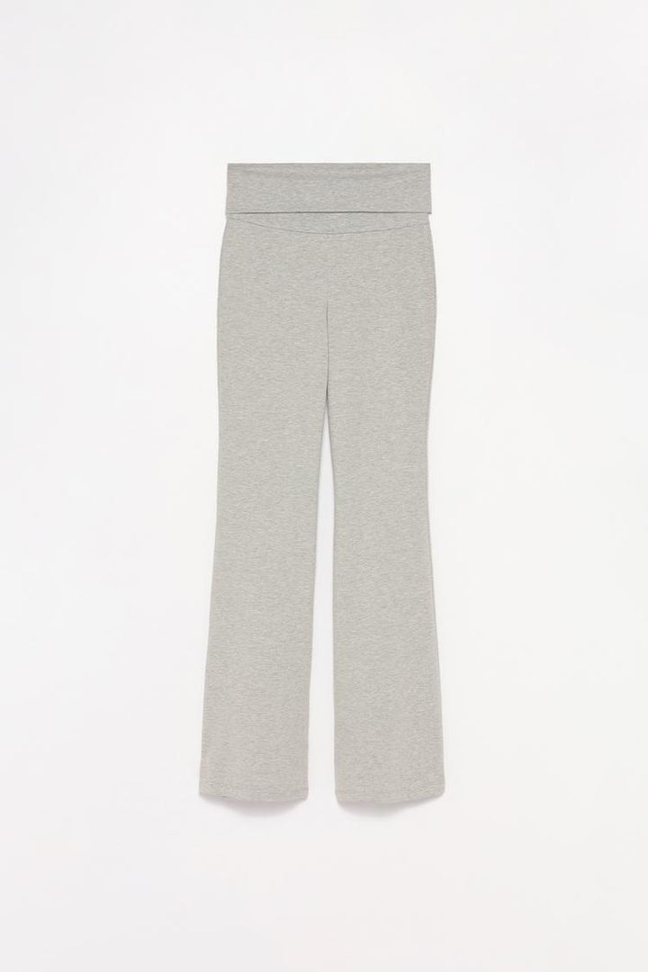 Full product shot of the grey leggings with a fold-over waistband, offering style and comfort.
