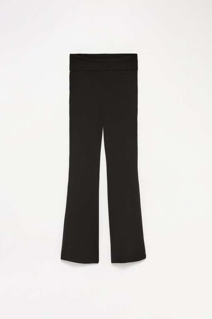 Complete product image displaying the leggings with the fold-over waist, focusing on both the fit and quality fabric.