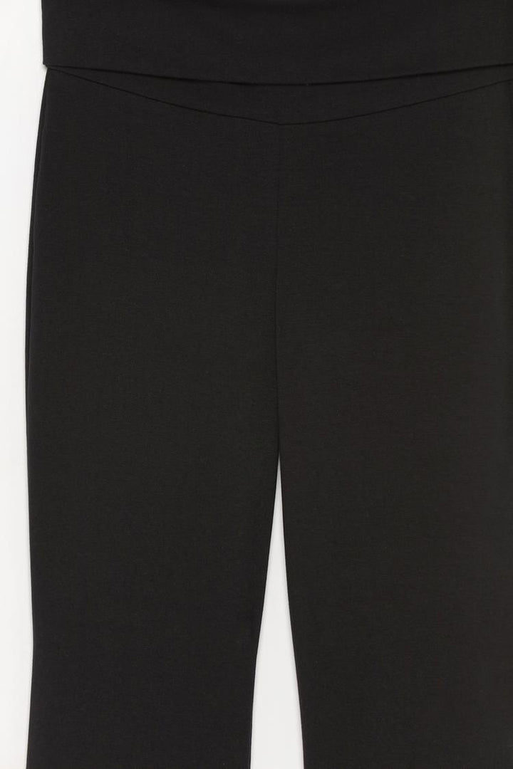 Product shot showcasing the full leggings with the fold-over waist design, emphasizing comfort and style.