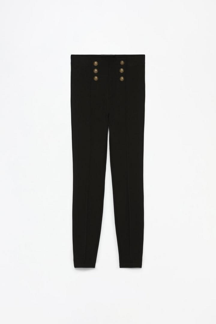 Full product image showcasing the sleek design and metallic button embellishments.