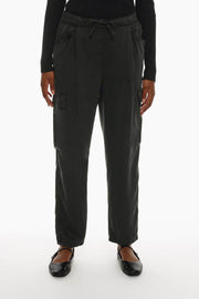 Front view of the black flowing cargo joggers, highlighting the elastic waistband and cargo pocket placement.