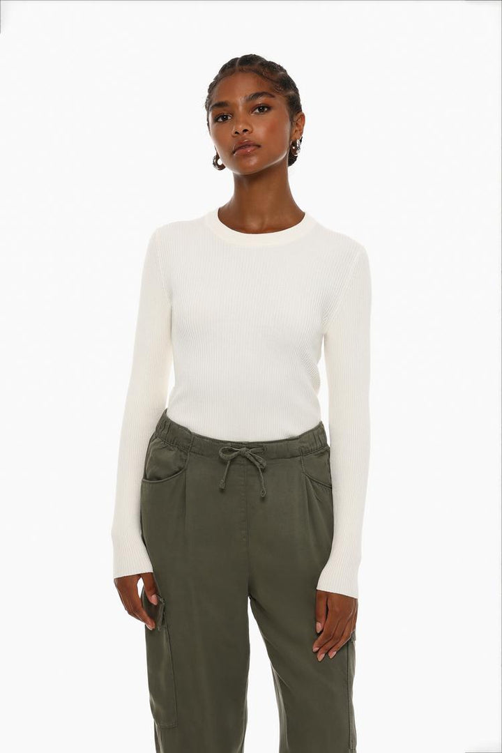 Full-body view of the green flowing cargo joggers, styled for a casual yet elevated outfit.