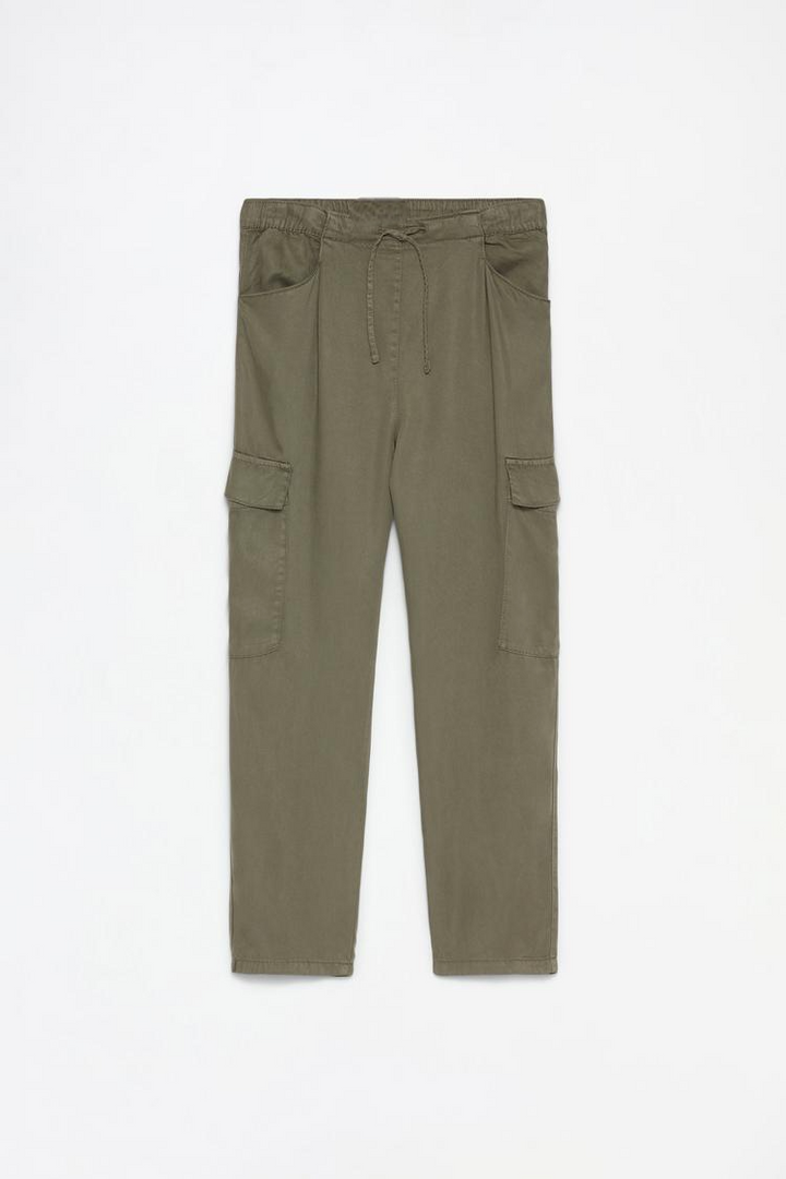 Complete product view of the green flowing cargo joggers, focusing on the fabric, fit, and details.