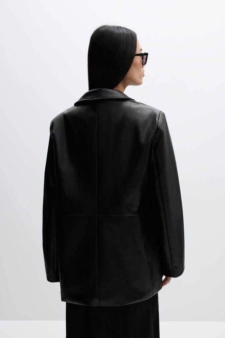 Back view of the women's leather blazer

