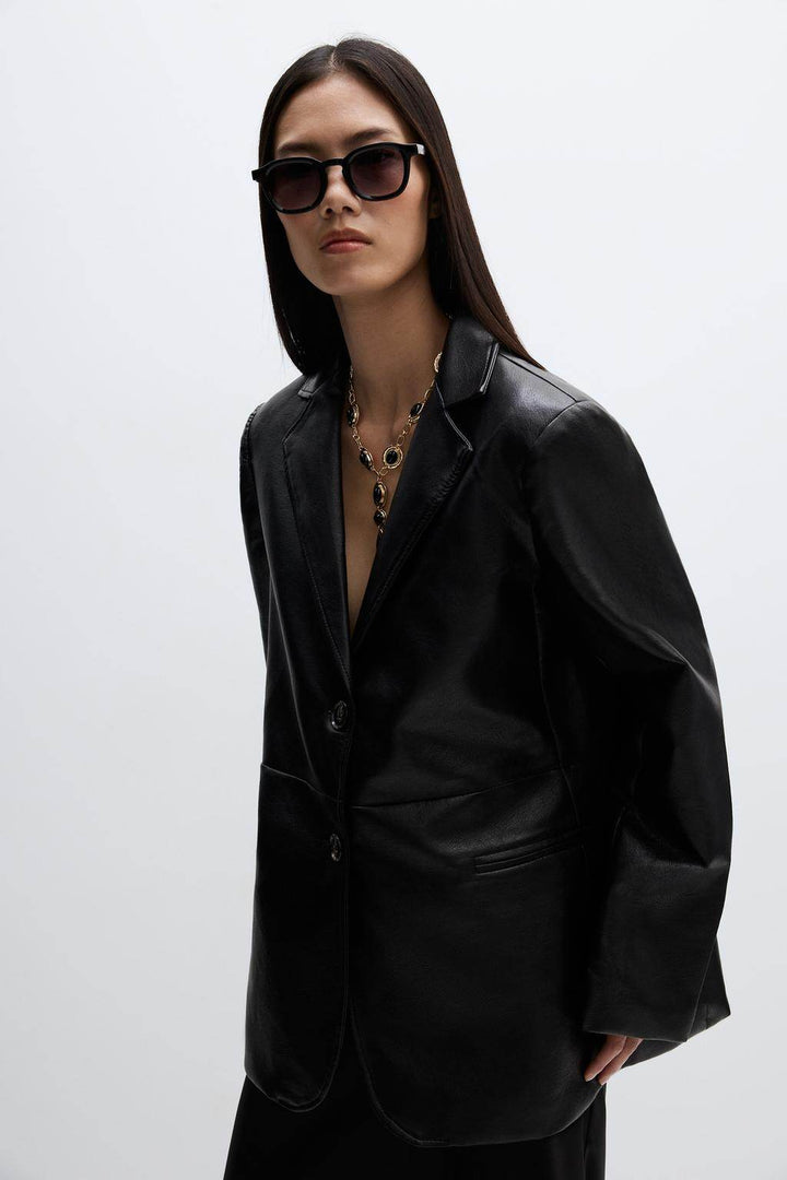 Front view of a women's genuine leather blazer

