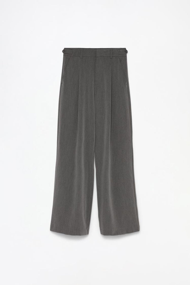 Complete product view of grey loose-fitting wide-leg trousers, ideal for everyday wear
