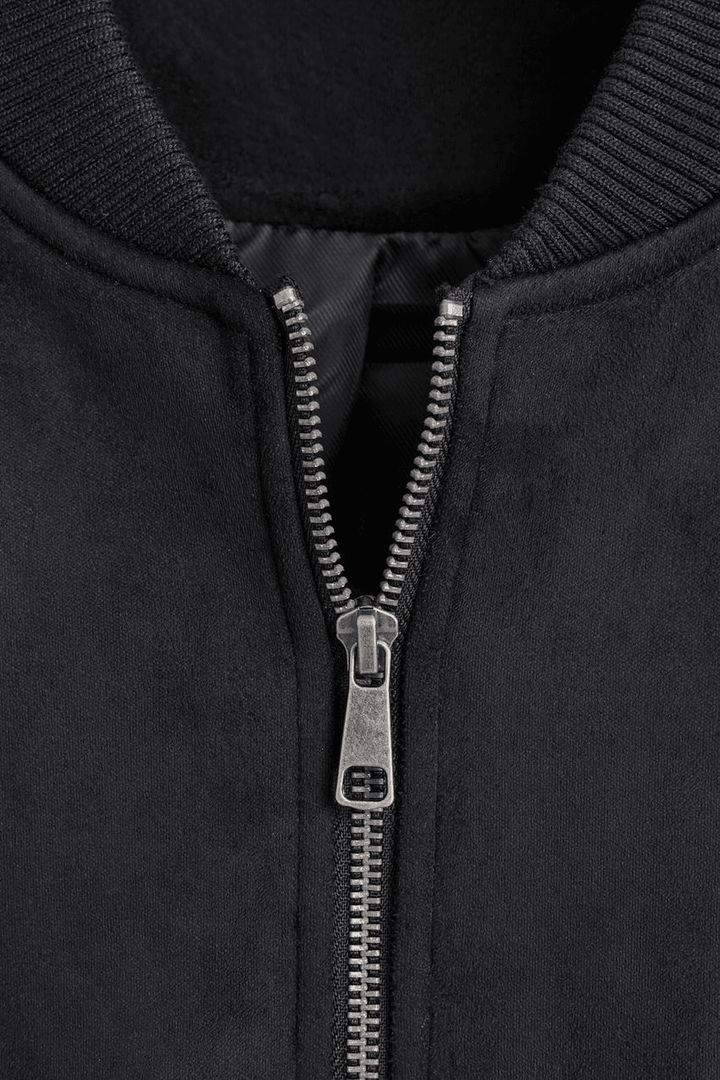 Close-up product image of black faux suede bomber

