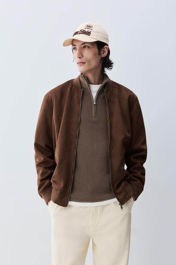 Front view of men's brown faux suede bomber jacket

