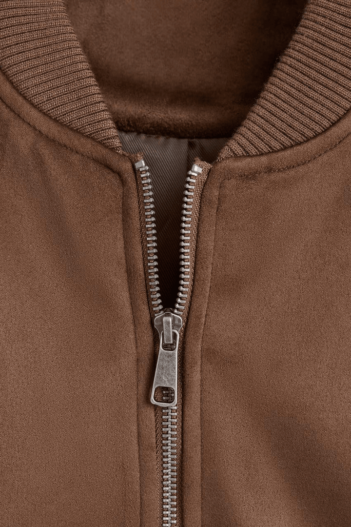 Close-up product image of brown faux suede bomber


