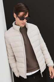 Side view of the men's grey lightweight puffer jacket

