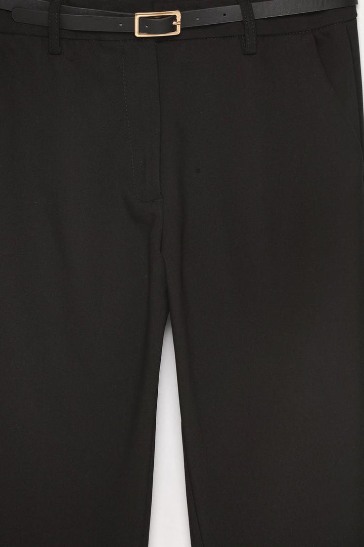 Back view of brown slim fit trousers with a belt, showcasing a refined fit