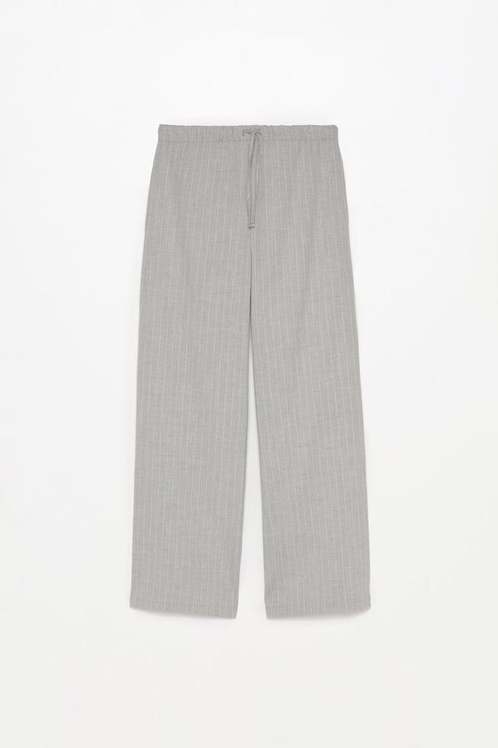 Full product view of grey smart trousers with a waistband, ideal for professional styling