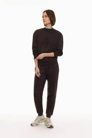 Tracksuit bottoms brown product image highlighting the casual, comfortable design and soft fabric ideal for everyday wear.