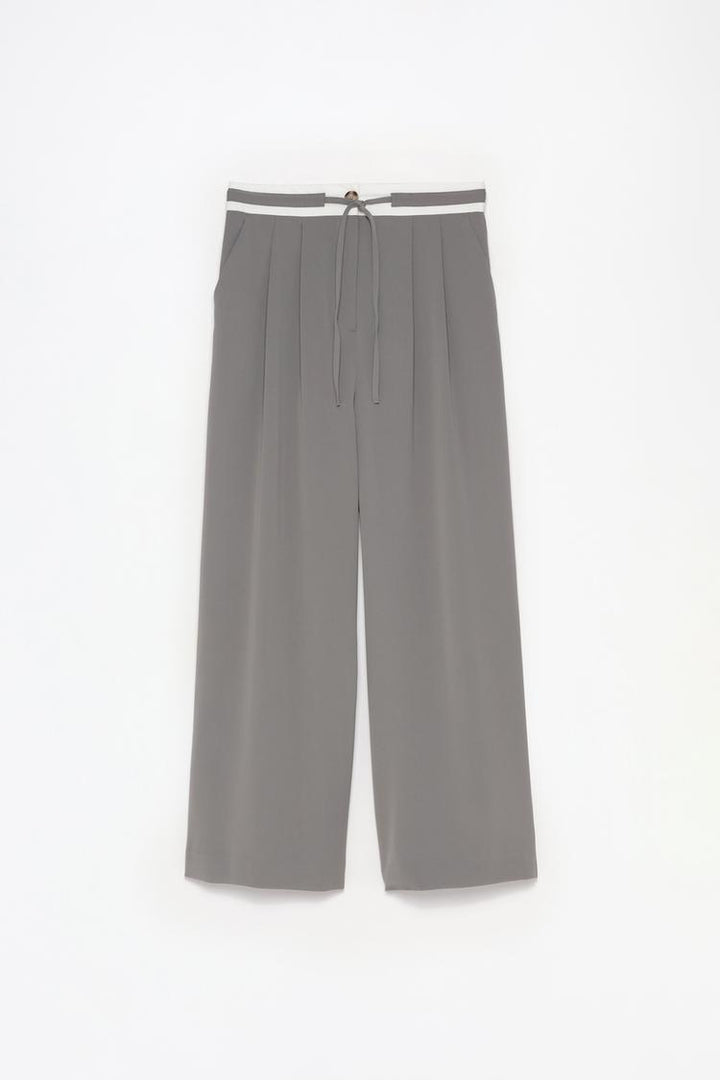 Comprehensive product image that details the full design of the trousers, ideal for online listings.
