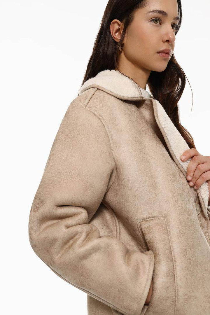 Close-up product image of beige brown double-faced coat

