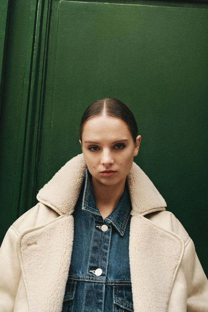 Side view of the women's beige brown double-faced coat

