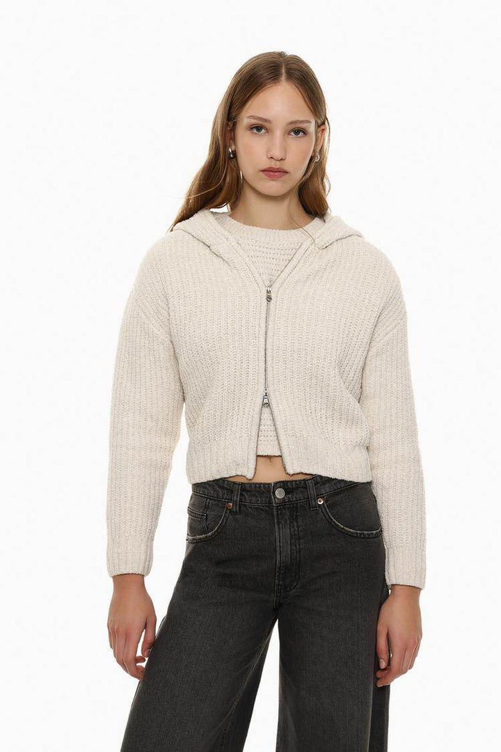 Front view of women's beige chenille jacket

