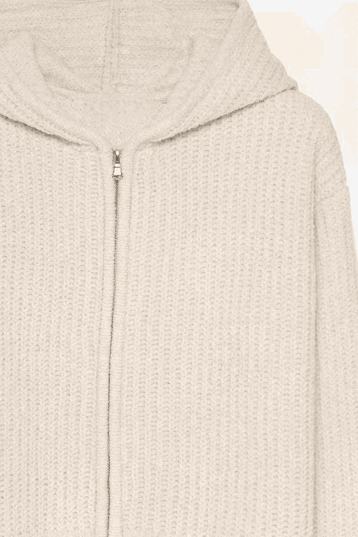 Close-up product image of beige chenille jacket

