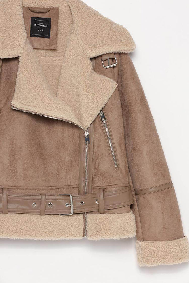 Product side view of beige double-faced crossover jacket

