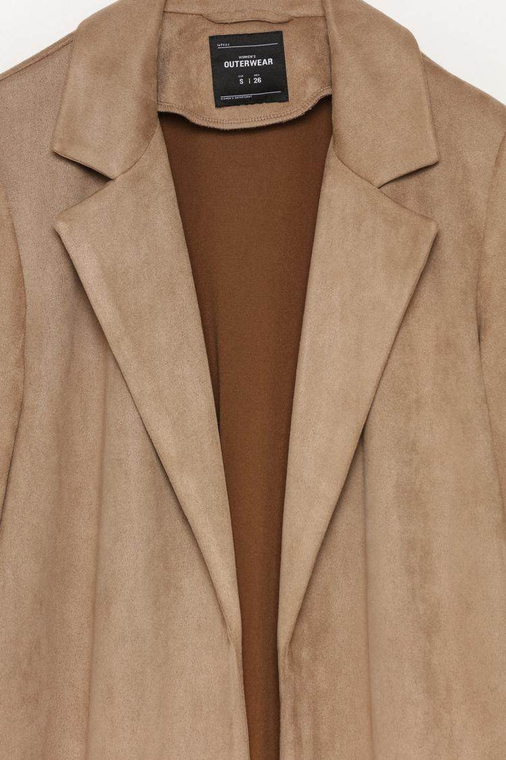 Close-up product image of beige faux suede coat

