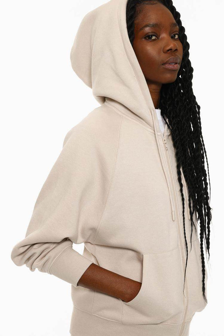 Side view of the women's beige hooded jacket

