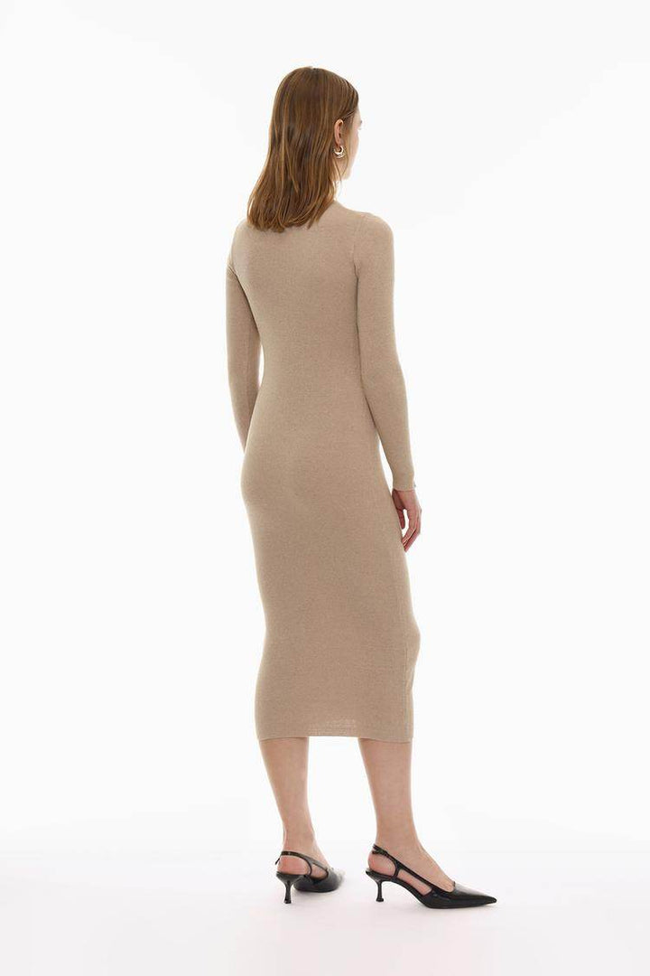Back view of the women's beige knit midi dress

