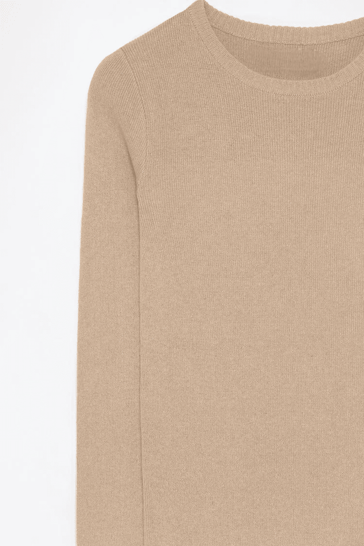 Close-up product image of the beige knit midi dress


