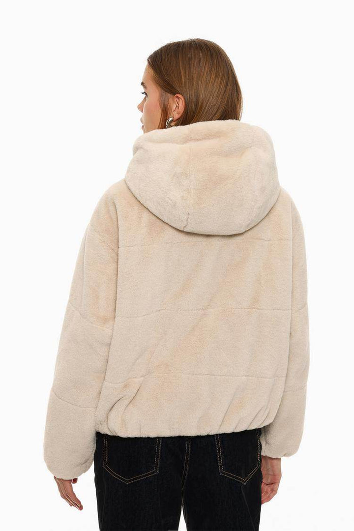 Back view of the women's beige short soft coat


