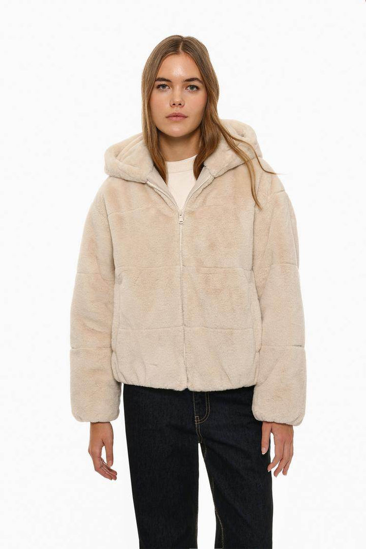 Front view of women's beige short soft coat

