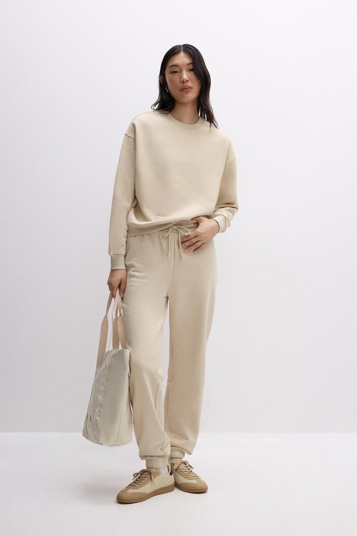 Front full view of a beige women's sweatshirt
