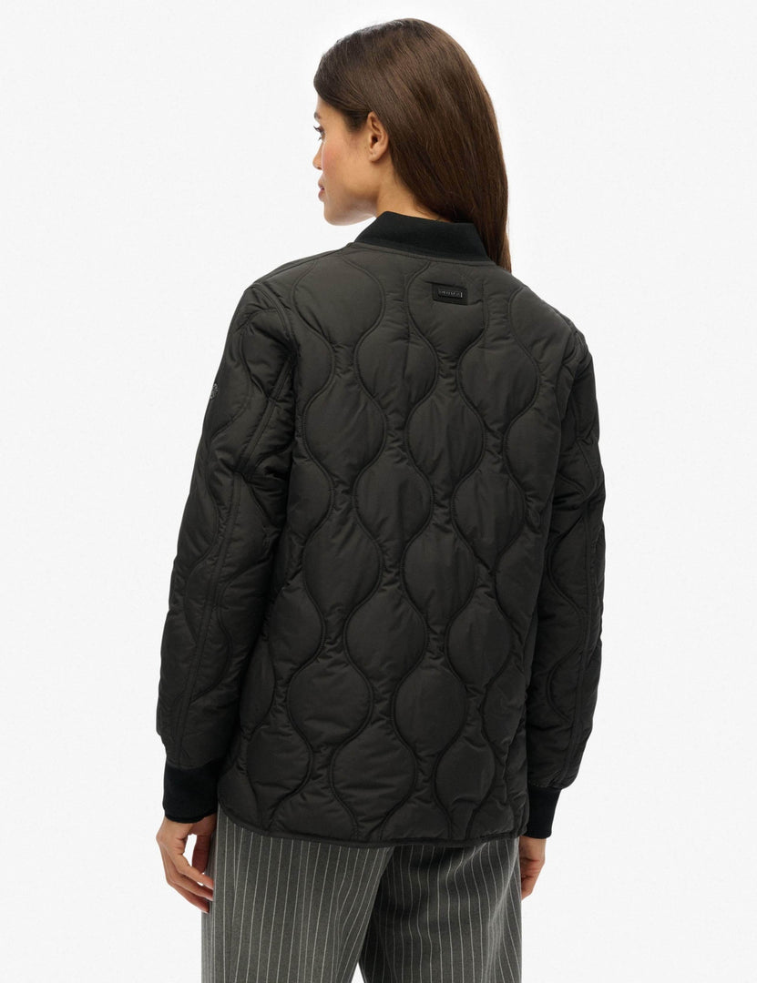 Back view of the women's black baseball collar jacket

