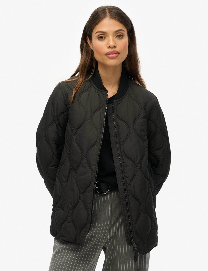Front view of a women's black baseball collar jacket

