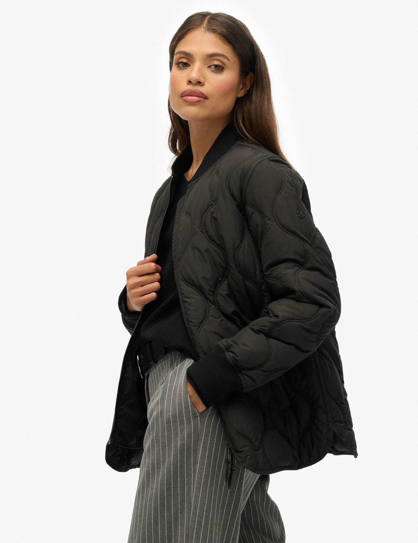 Side view of the women's black baseball collar jacket

