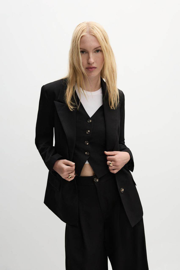 Front full body view of a black women's blazer
