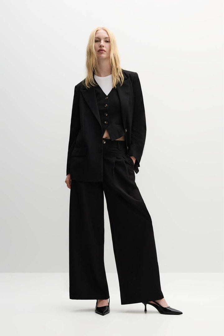 Full body view of a black women's blazer
