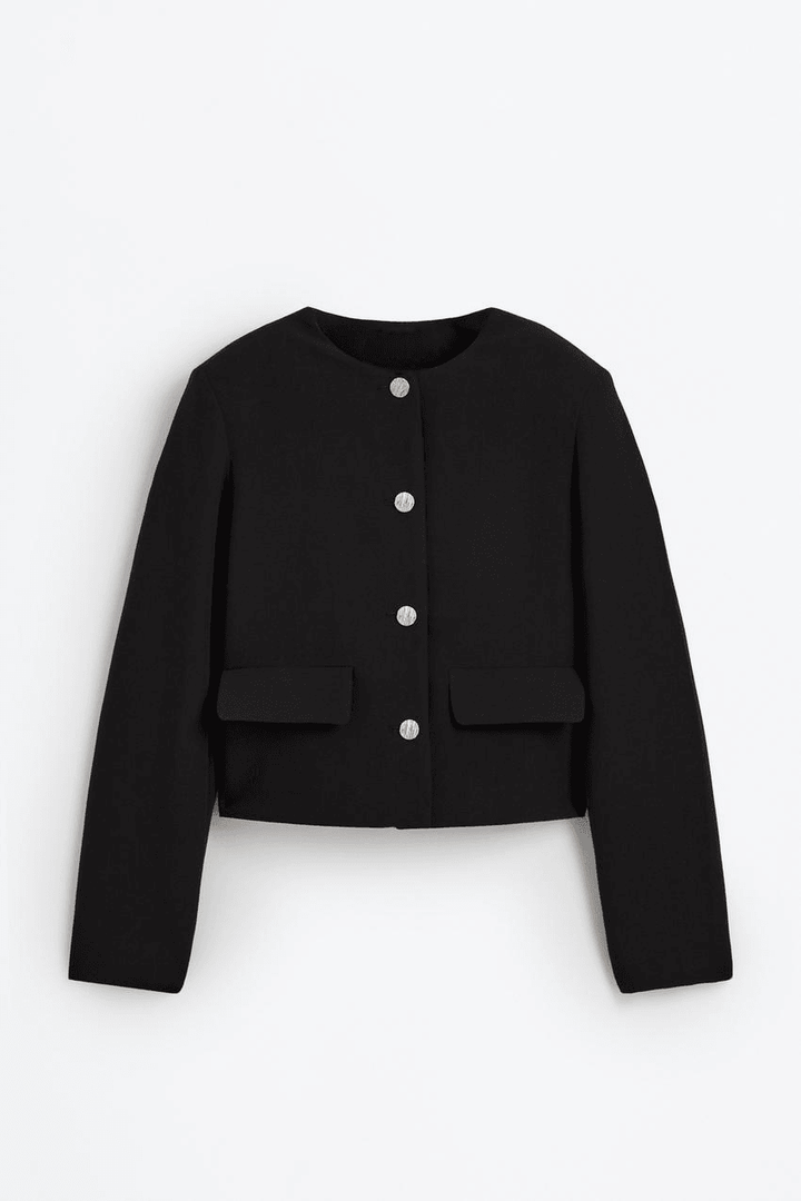 Front view of a black women's cropped blazer
