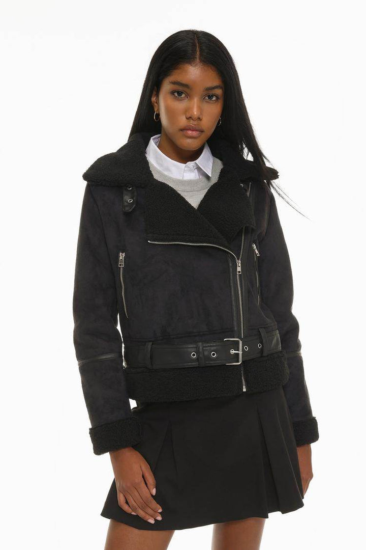 Front view of women's black double-faced crossover jacket

