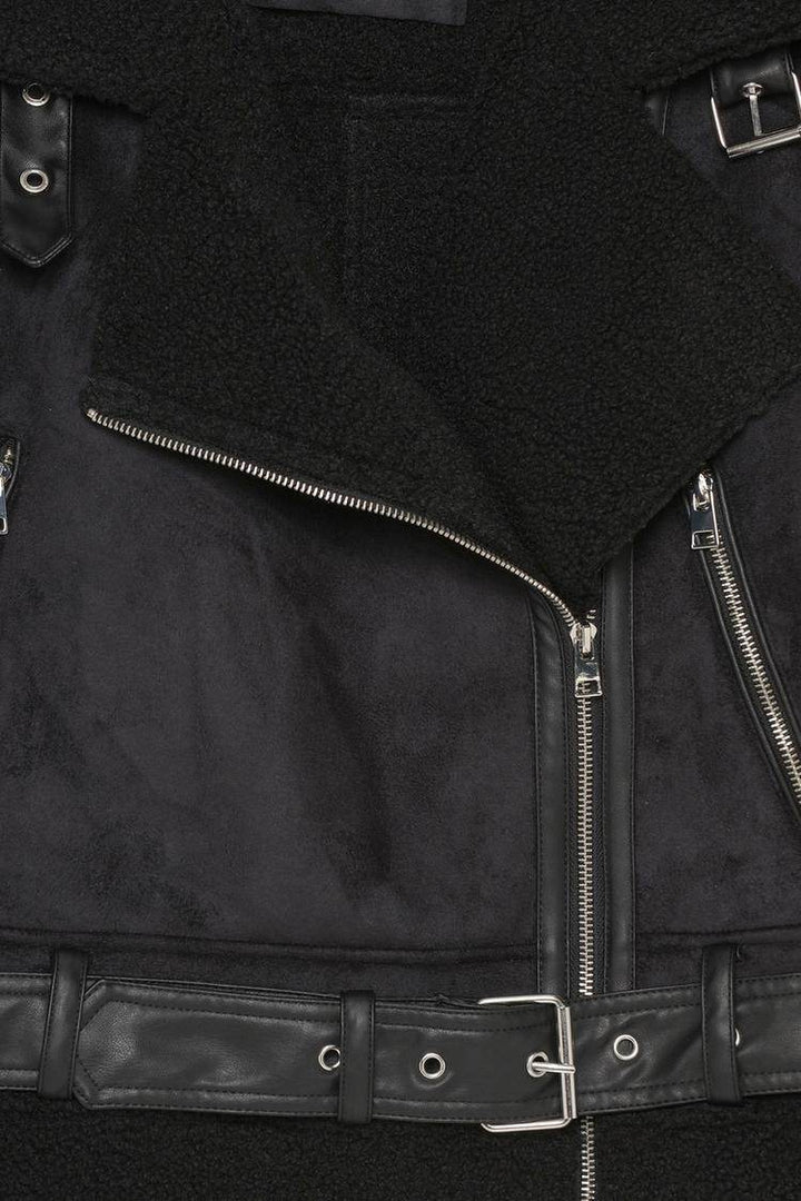 Close-up of black double-faced jacket fabric texture

