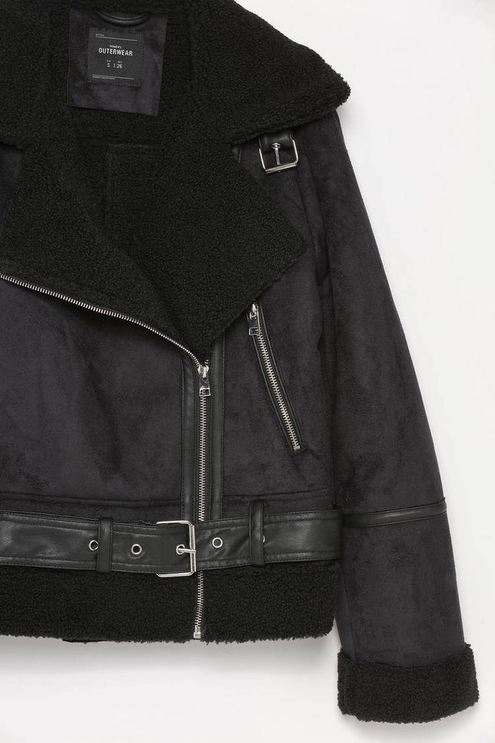Side view product image of black crossover jacket

