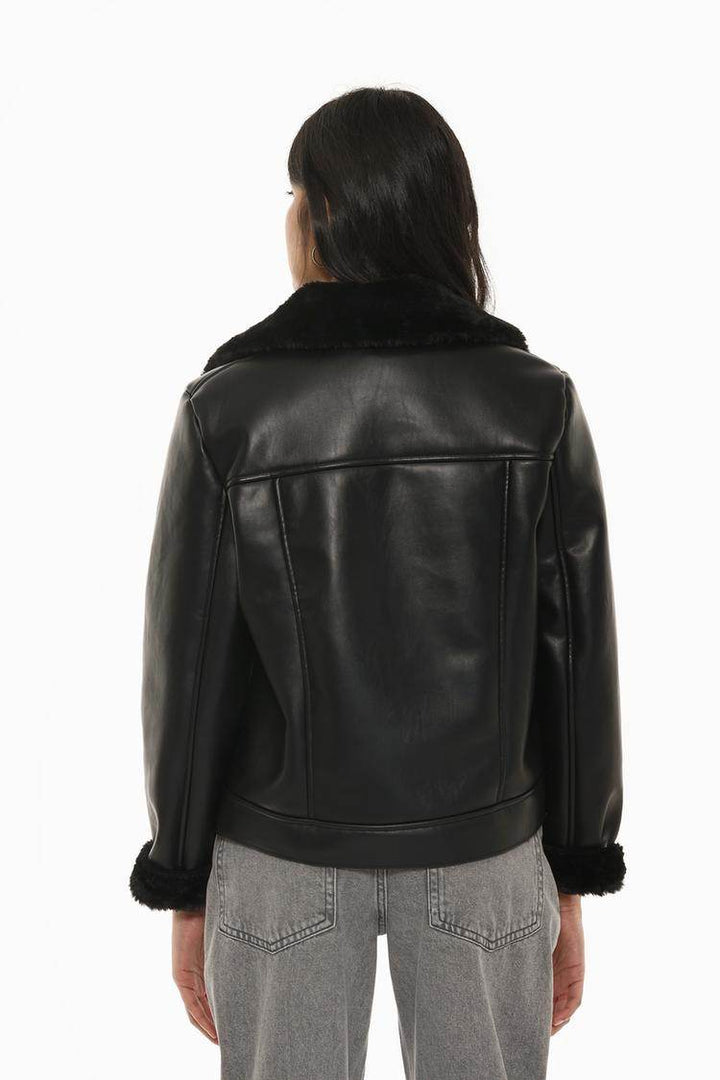 Back view of the women's faux leather double-faced jacket

