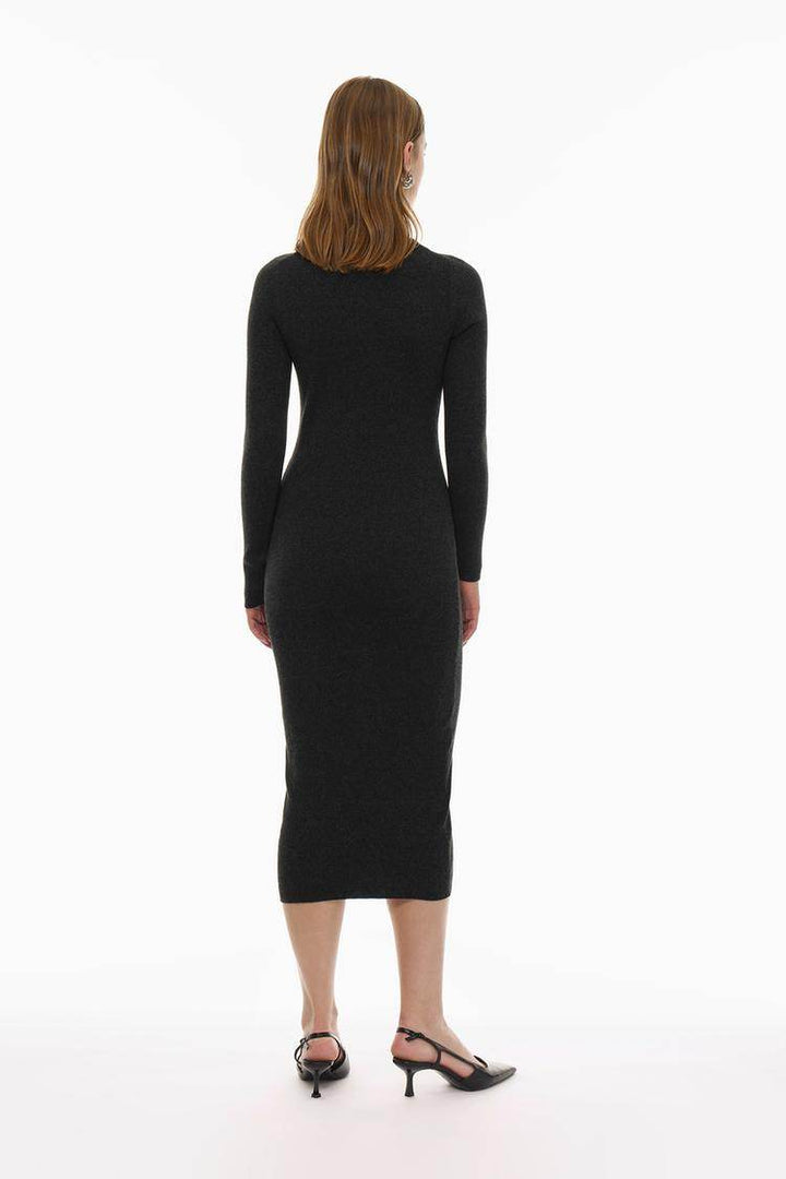 Back view of the women's black knit midi dress

