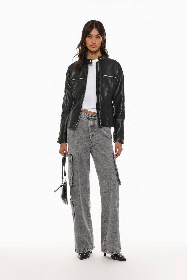 Full body front view of woman wearing leather effect jacket

