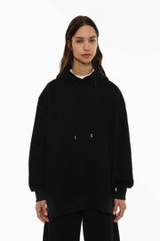 Front view of women's black oversized plush sweatshirt


