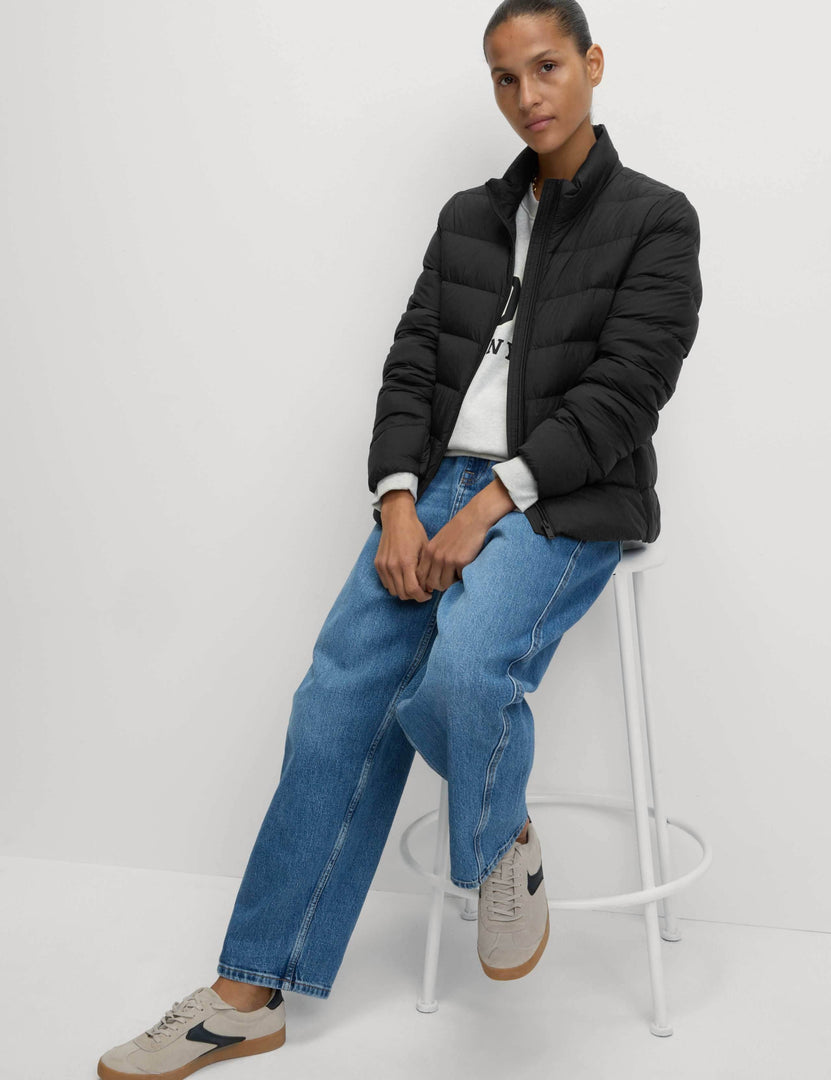 Front view of the women's black puffer jacket

