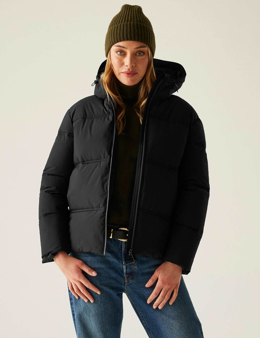Front view of a women's black quilted hooded puffer jacket

