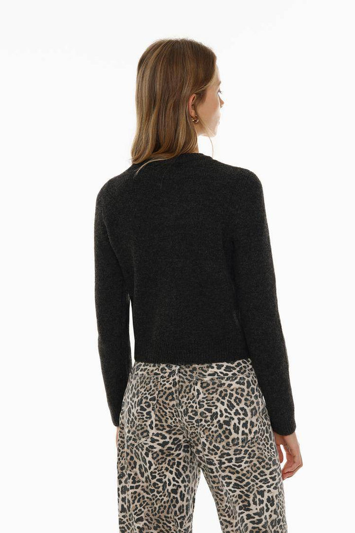 Back view of the women's black rounded neck knit cardigan

