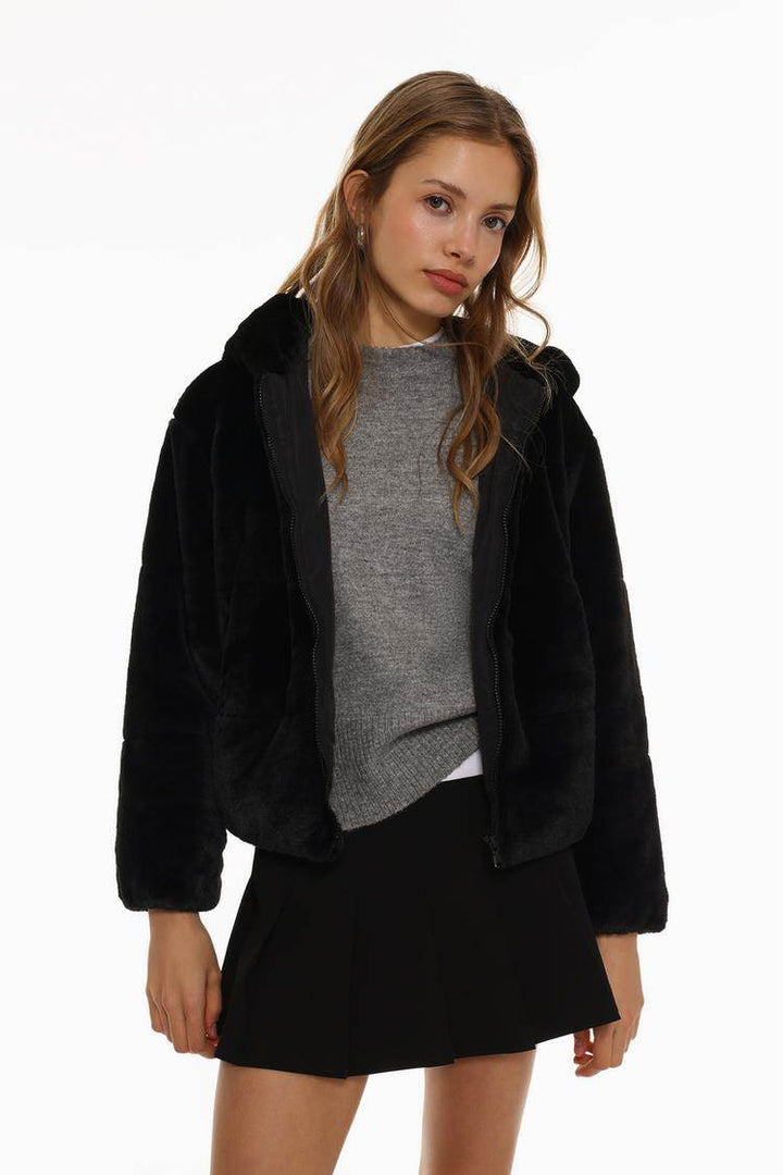 Front view of women's black short soft coat

