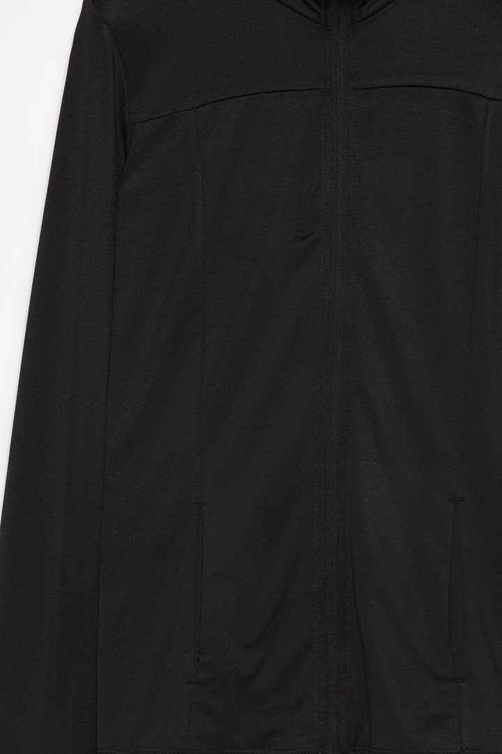 Close-up of black sports jacket fabric texture

