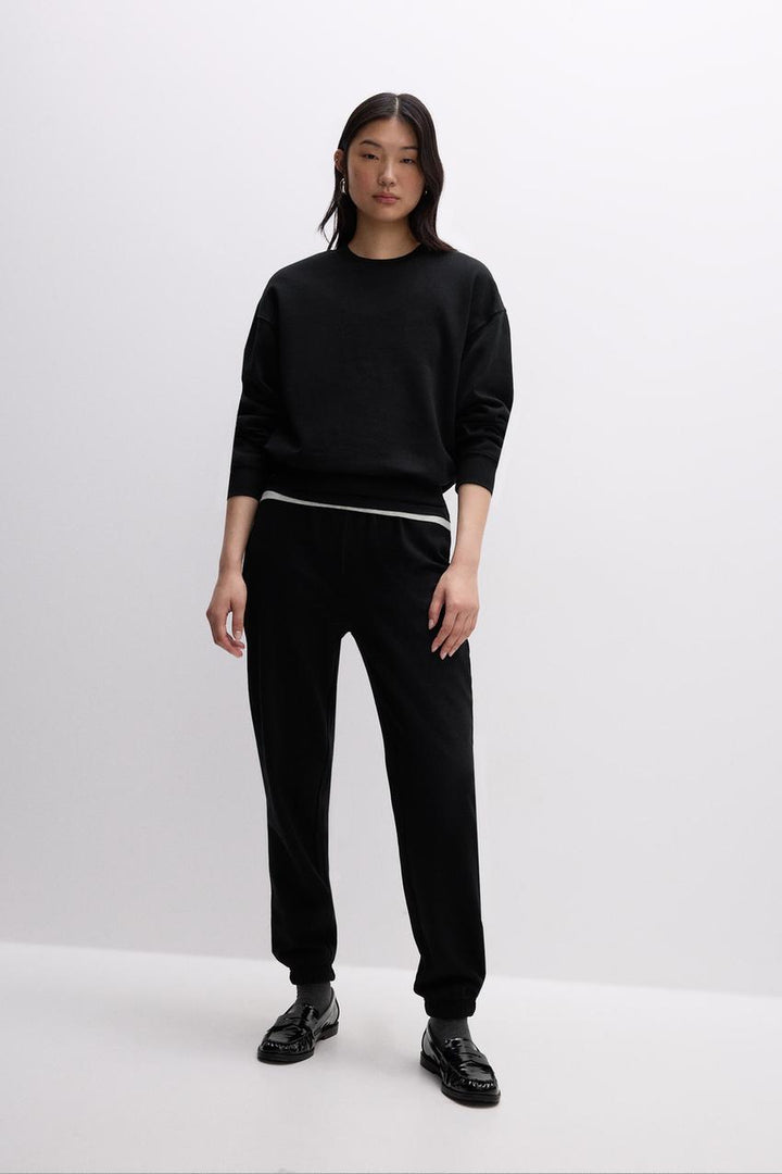 Front full view of a black women's sweatshirt
