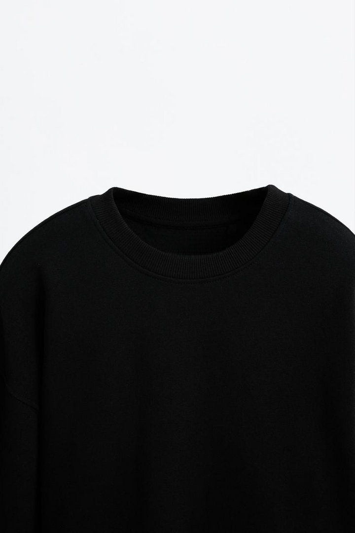 Zoomed view of a black women's sweatshirt
